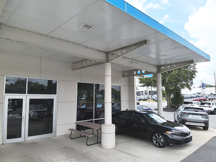 Before shot of the Honda dealership in Frederick, MD with a dirty canopy